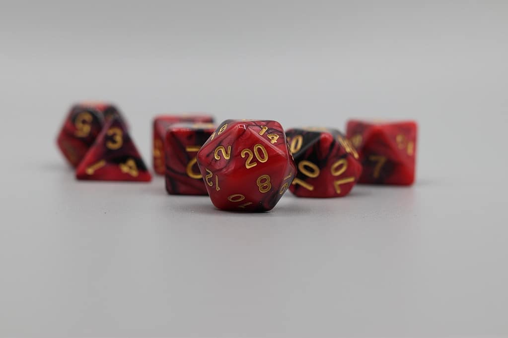 Current image: Five red dice on a white background